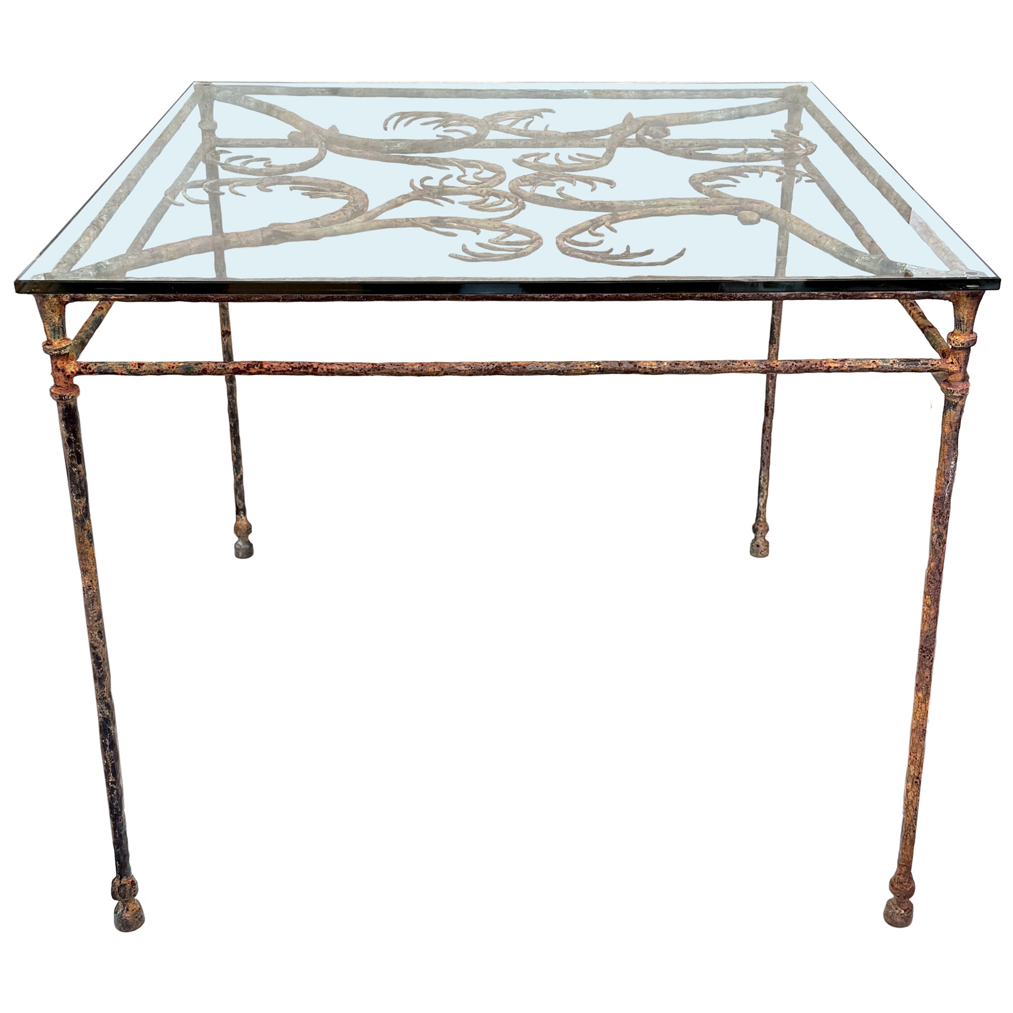 Wrought Iron & Glass Outdoor Dining Table with Phylomorphic Motif